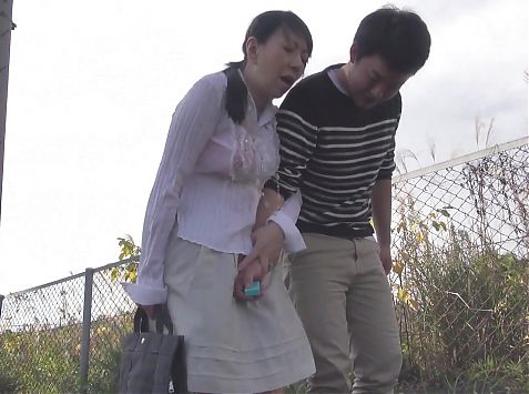 Mature Japanese wife remote control vibrator outside stroll